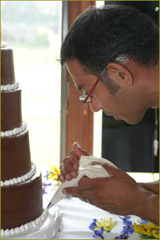Albert Trevino decorating cake